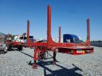 2025 Magnolia Log Trailer, auction photograph